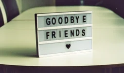 A sign that says goodbye friends