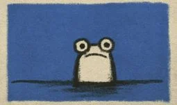 a frog surfacing in some water 