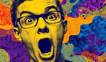 an excited man in glasses 
