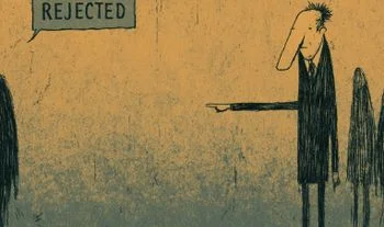 A man pointing and a sign that says rejected