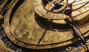 an ancient brass clock