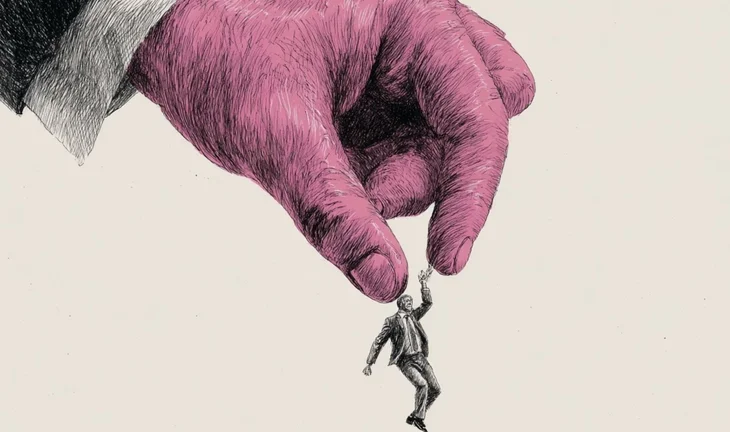 some fingers pinching a small banker 