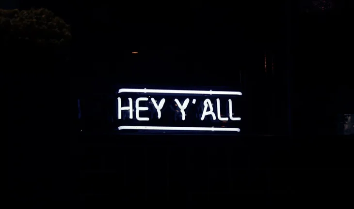 A sign that says hey y'all 