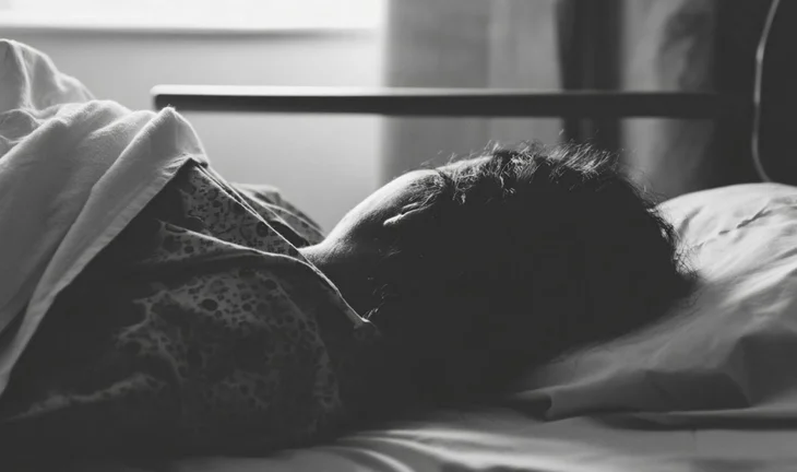 woman in bed in hospital 