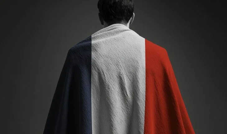 French banker wrapped in a French flag