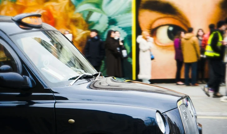 A London black cab in motion