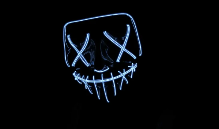 a neon blue mask