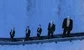 Barclays bankers on a conveyor belt 